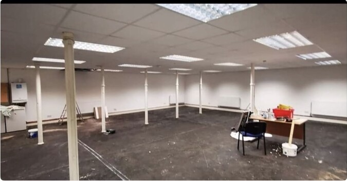 The white open-plan room at The Stables before work began on Peggy McCools